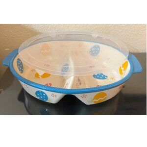 This listing is for "Temptations" "Old World Egg Hunt" Oval Baker w/Plastic Lid